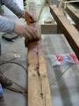 Camp Barn Restoration / Cannon Salvage workers cleaning, applying borate, and waxing the frame. Camp Barn Restoration / Cannon Salvage workers cleaning, applying borate, and waxing the frame.